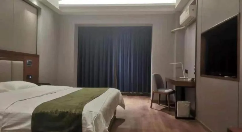 Bed in GreenTree Inn Jiuquan Century Plaza Hotel