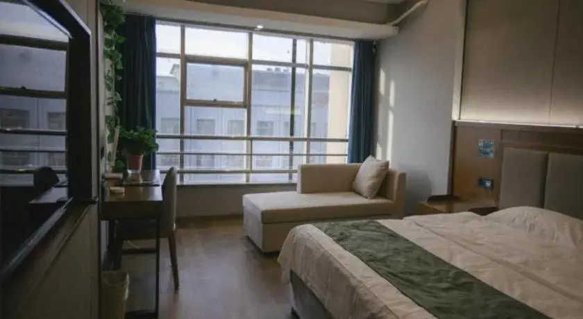 Bed in GreenTree Inn Jiuquan Century Plaza Hotel Bed in GreenTree Inn Jiuquan Century Plaza Hotel