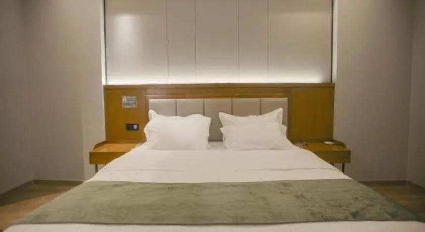 Bed in GreenTree Inn Jiuquan Century Plaza Hotel
