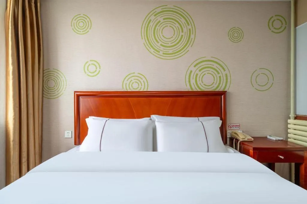 Bed in GreenTree Inn Yantai Xingfu Road Marina Plaza Express Hotel
