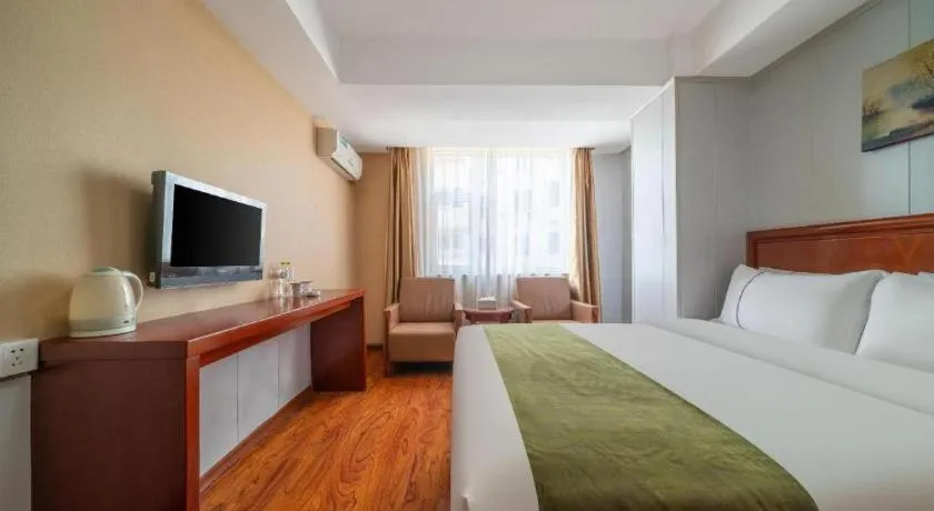 Bed in GreenTree Inn Yantai Xingfu Road Marina Plaza Express Hotel