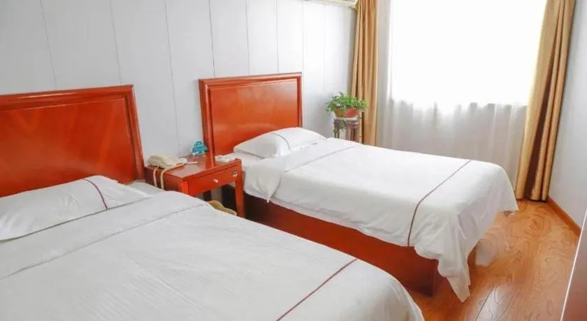 Bed in GreenTree Inn Yantai Xingfu Road Marina Plaza Express Hotel