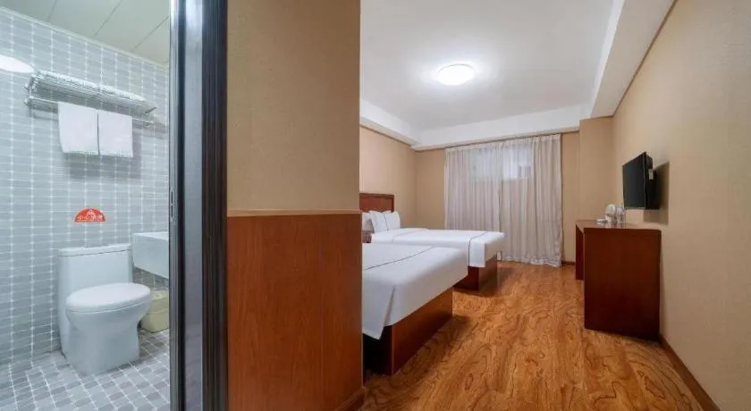 Bed in GreenTree Inn Yantai Xingfu Road Marina Plaza Express Hotel