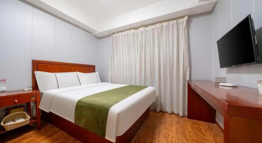 Bed in GreenTree Inn Yantai Xingfu Road Marina Plaza Express Hotel