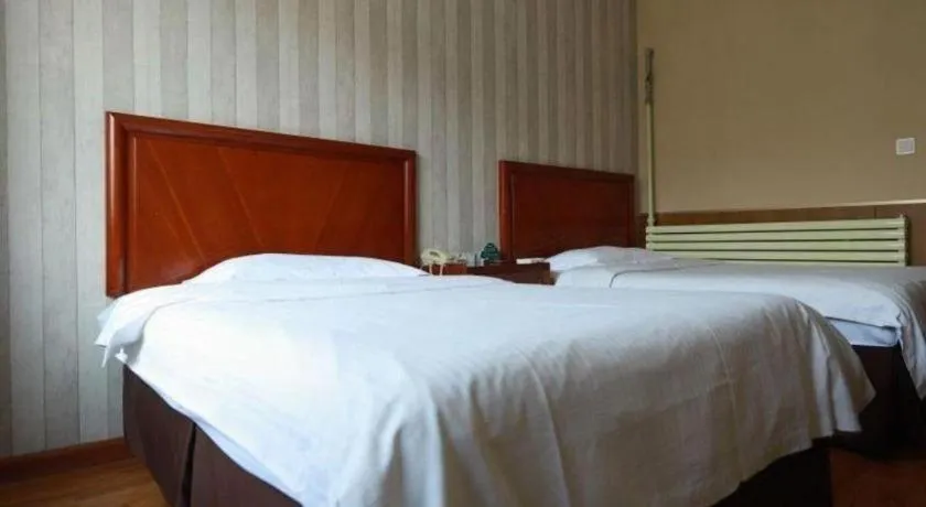 Bed in GreenTree Inn Yantai Xingfu Road Marina Plaza Express Hotel