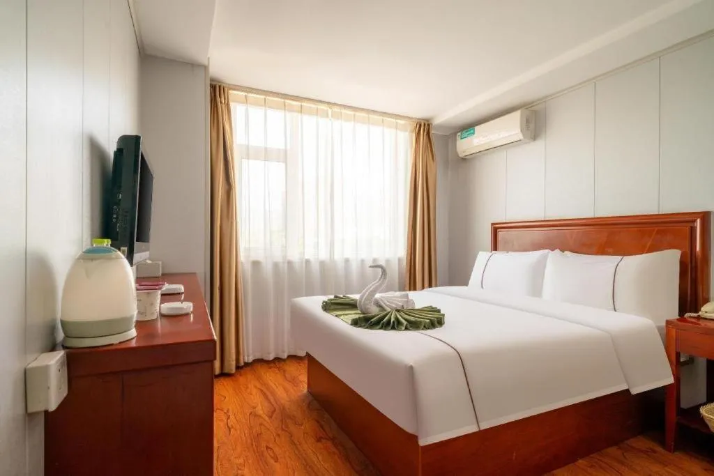 Bed in GreenTree Inn Yantai Xingfu Road Marina Plaza Express Hotel