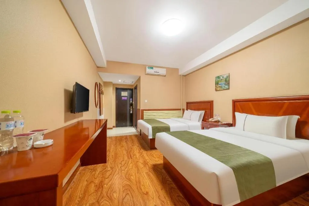 Bed in GreenTree Inn Yantai Xingfu Road Marina Plaza Express Hotel