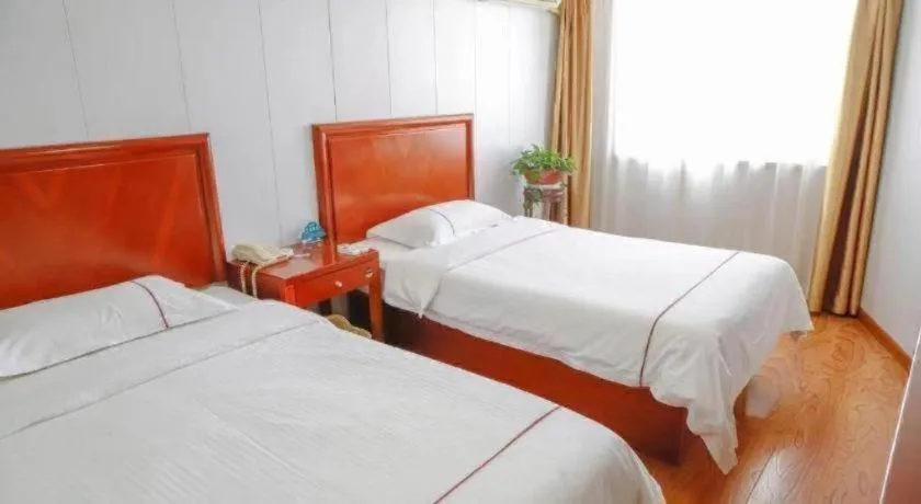 Bed in GreenTree Inn Yantai Xingfu Road Marina Plaza Express Hotel