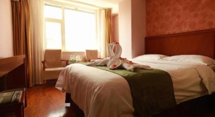 Bed in GreenTree Inn Yantai Xingfu Road Marina Plaza Express Hotel