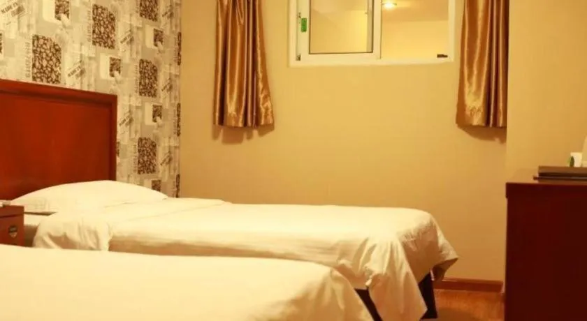 Bed in GreenTree Inn Yantai Xingfu Road Marina Plaza Express Hotel