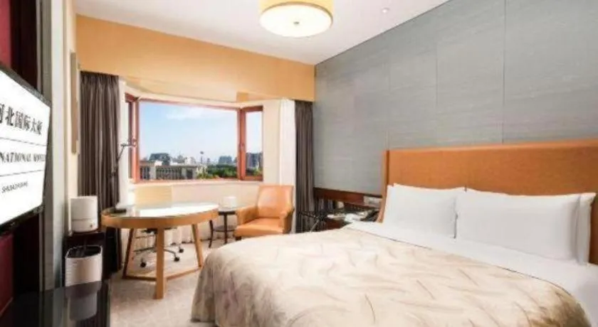 Bed in Shijiazhuang International Building Hotel