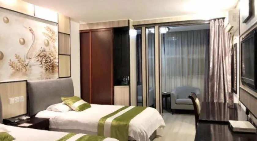 Bed in GreenTree Inn Taicang Baolong Square Hotel