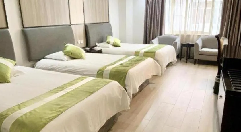 Bed in GreenTree Inn Taicang Baolong Square Hotel