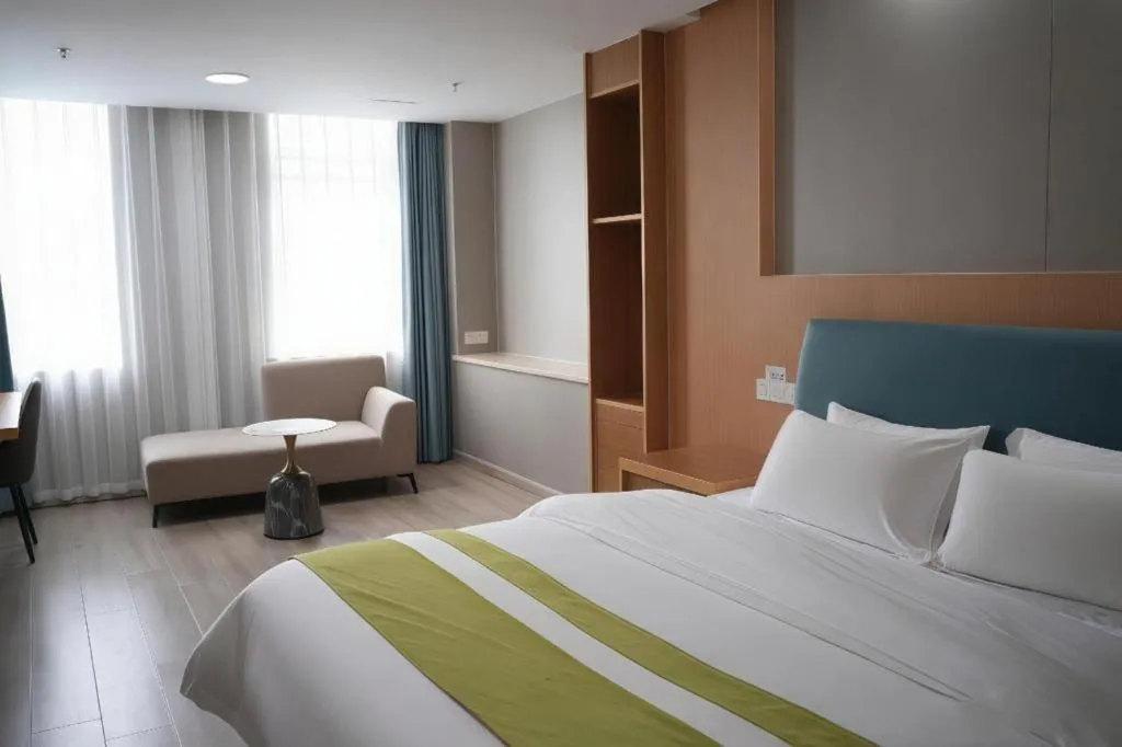 Bed in GreenTree Inn Taicang Baolong Square Hotel