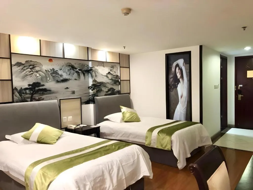 Bed in GreenTree Inn Taicang Baolong Square Hotel