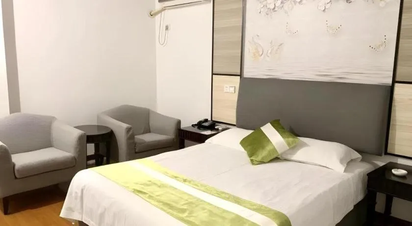 Bed in GreenTree Inn Taicang Baolong Square Hotel