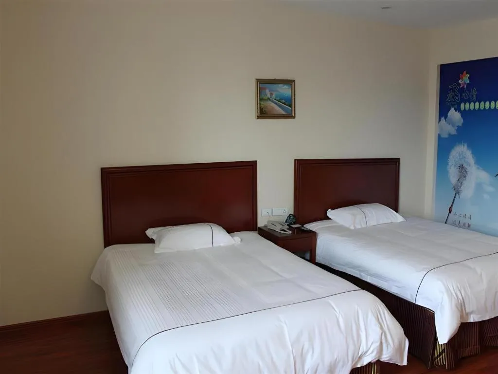 Bed in GreenTree Inn Taicang Baolong Square Hotel
