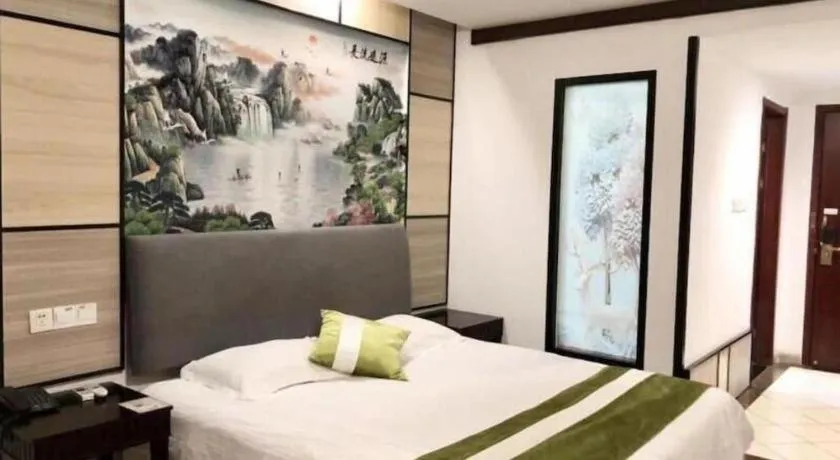 Bed in GreenTree Inn Taicang Baolong Square Hotel