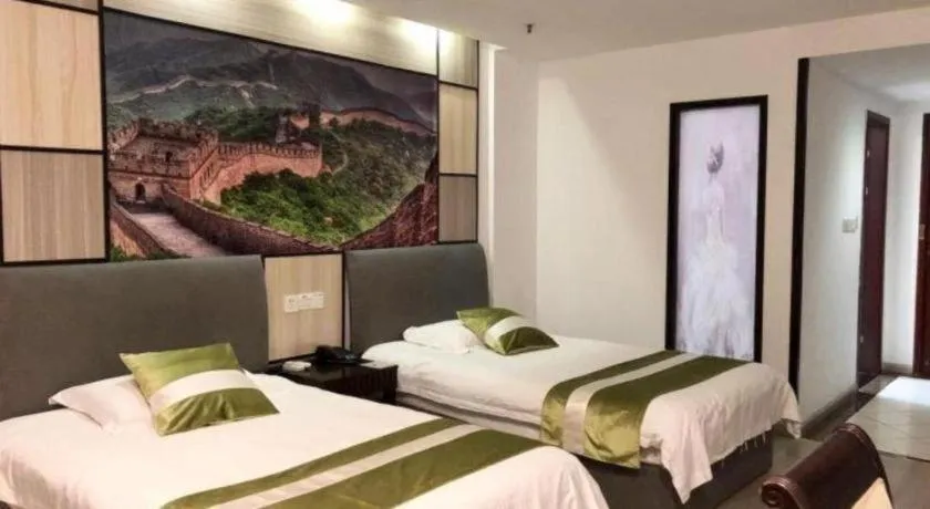 Bed in GreenTree Inn Taicang Baolong Square Hotel