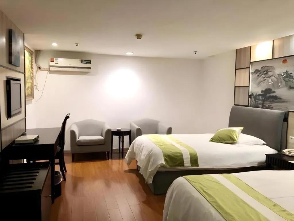 Bed in GreenTree Inn Taicang Baolong Square Hotel