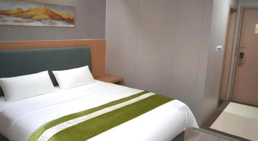 Bed in GreenTree Inn Taicang Baolong Square Hotel