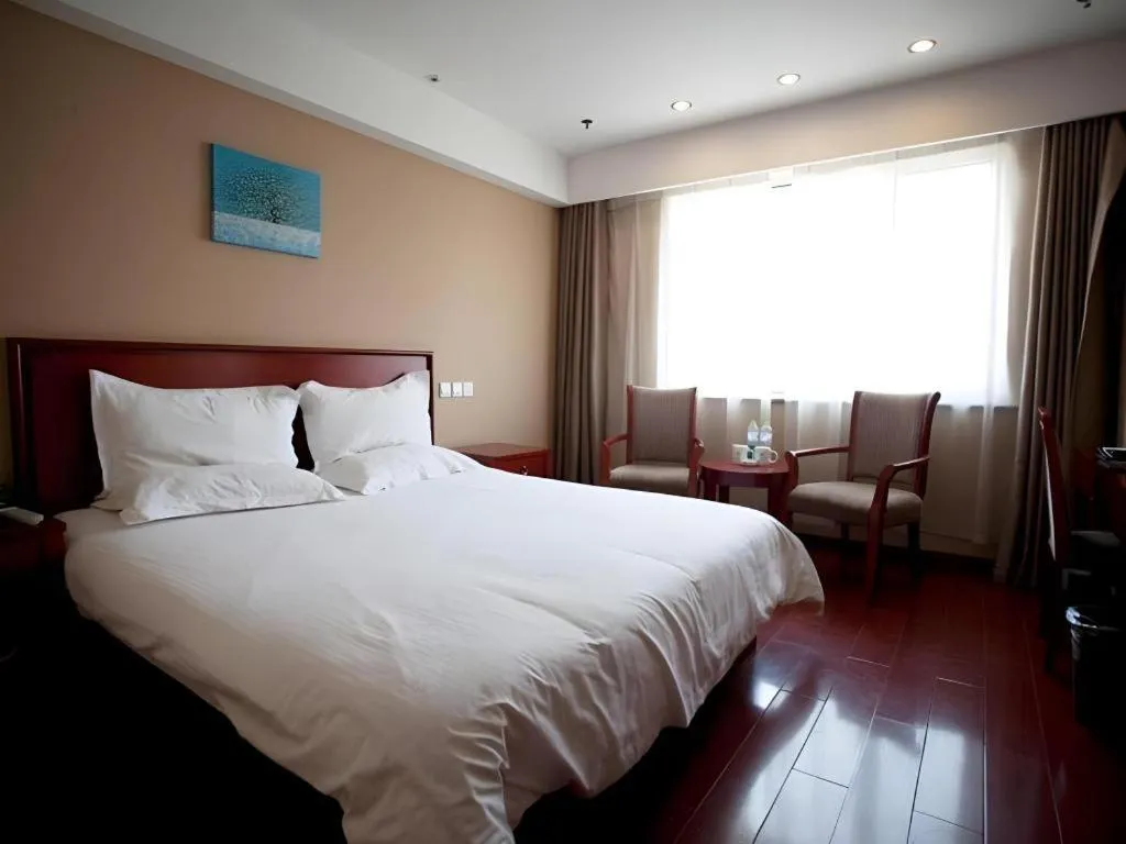 Bed in GreenTree Inn Rizhao Haiqu East Road Hotel