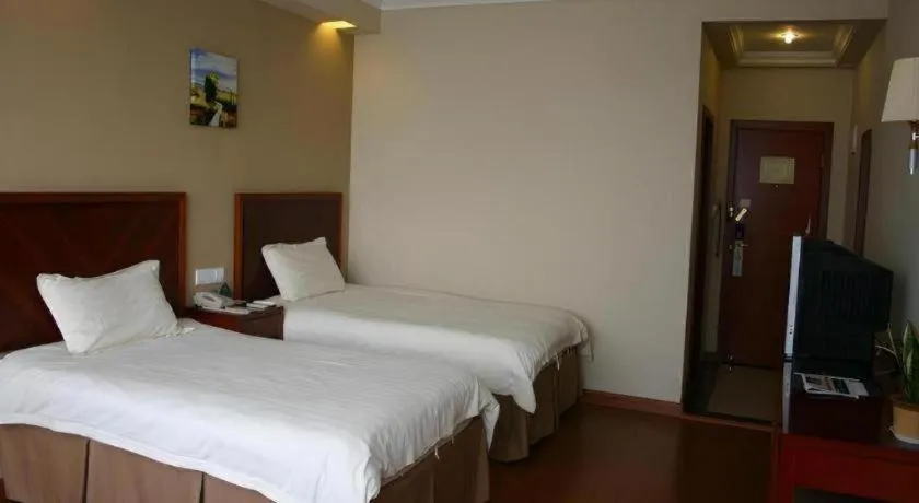Bed in GreenTree Inn Rizhao Haiqu East Road Hotel