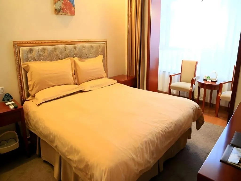 Bed in GreenTree Inn Rizhao Haiqu East Road Hotel