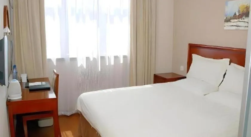 Bed in GreenTree Inn Rizhao Haiqu East Road Hotel