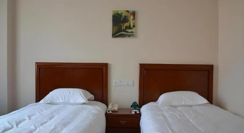 Bed in GreenTree Inn Rizhao Haiqu East Road Hotel