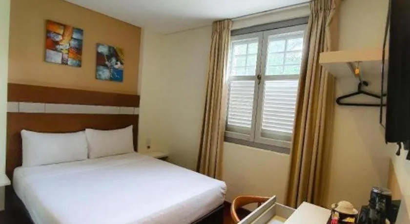 Bed in The Keong Saik Hotel