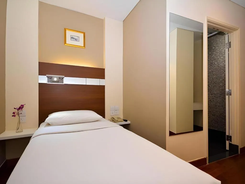 Bed in The Keong Saik Hotel