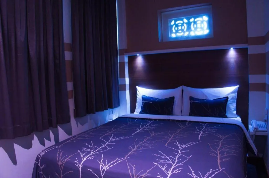 Bed in The Keong Saik Hotel