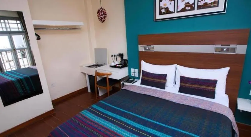 Bed in The Keong Saik Hotel