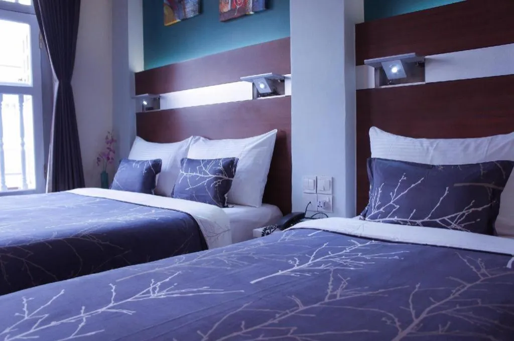 Bed in The Keong Saik Hotel