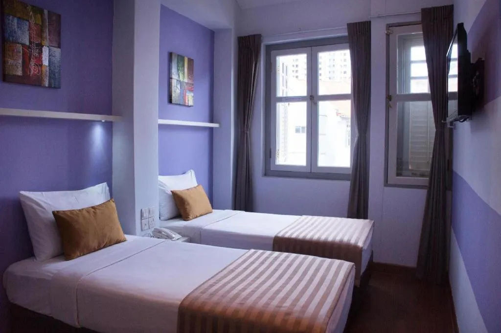 Bed in The Keong Saik Hotel