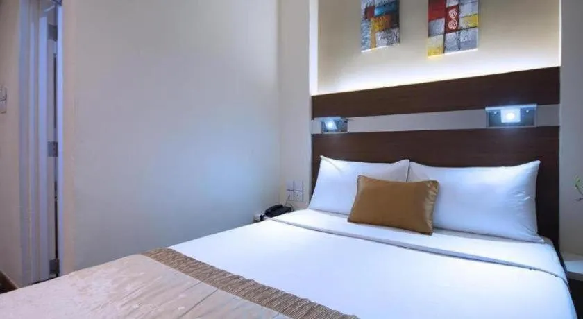 Bed in The Keong Saik Hotel