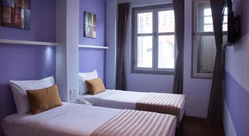 Bed in The Keong Saik Hotel