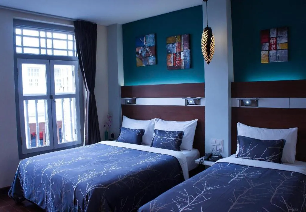 Bed in The Keong Saik Hotel