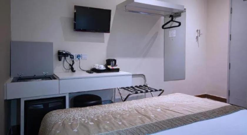 Bed in The Keong Saik Hotel