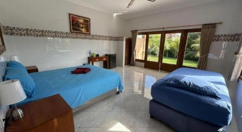 Bed in Tulamben Wreck Divers Resort & Restaurant