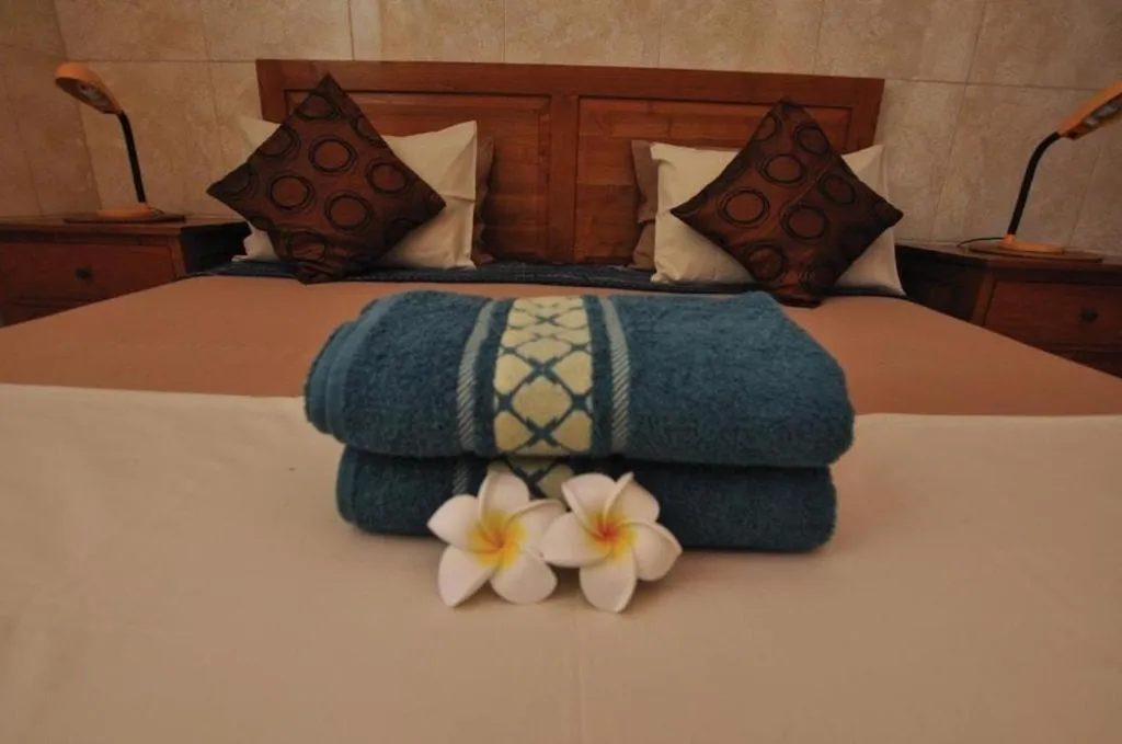 Bed in Tulamben Wreck Divers Resort & Restaurant