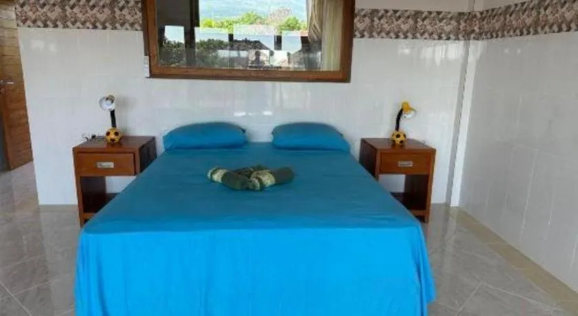 Bed in Tulamben Wreck Divers Resort & Restaurant