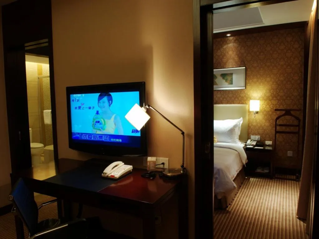 Bed in Yiwu Shinsun International Hotel