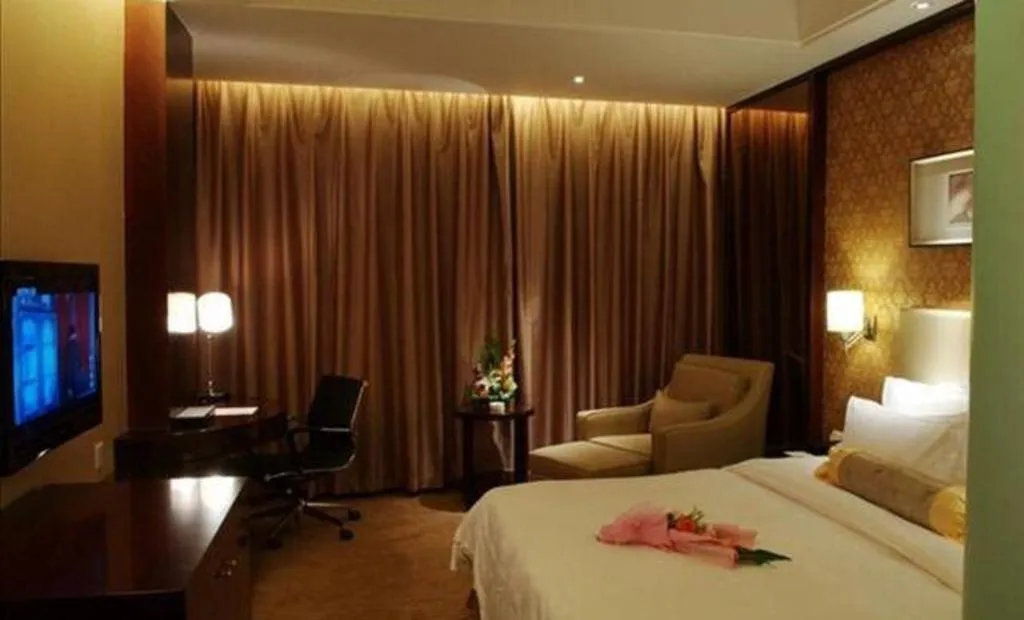 Bed in Yiwu Shinsun International Hotel