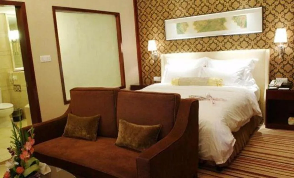 Bed in Yiwu Shinsun International Hotel