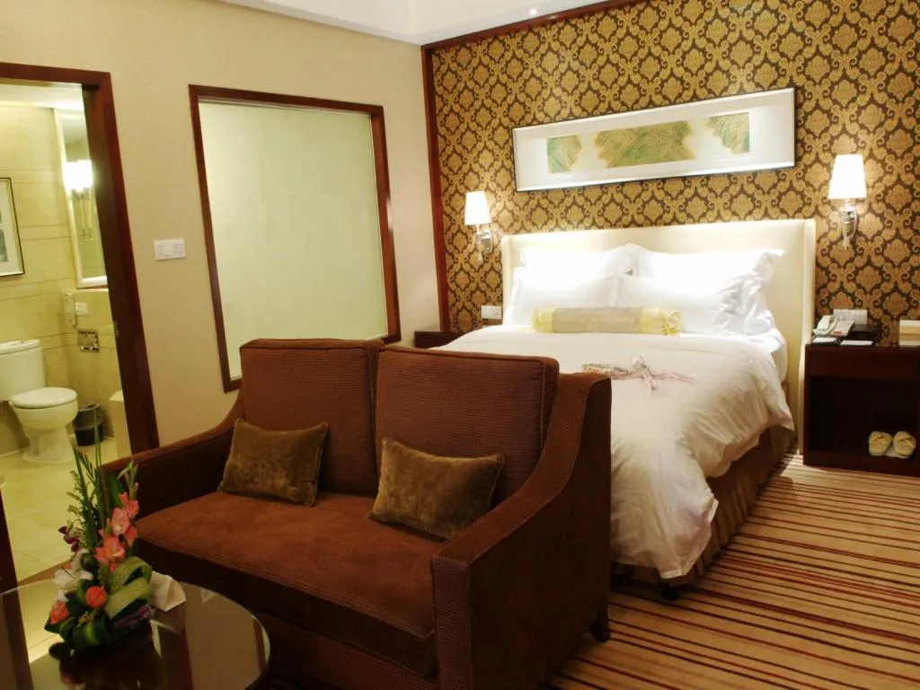 Bed in Yiwu Shinsun International Hotel