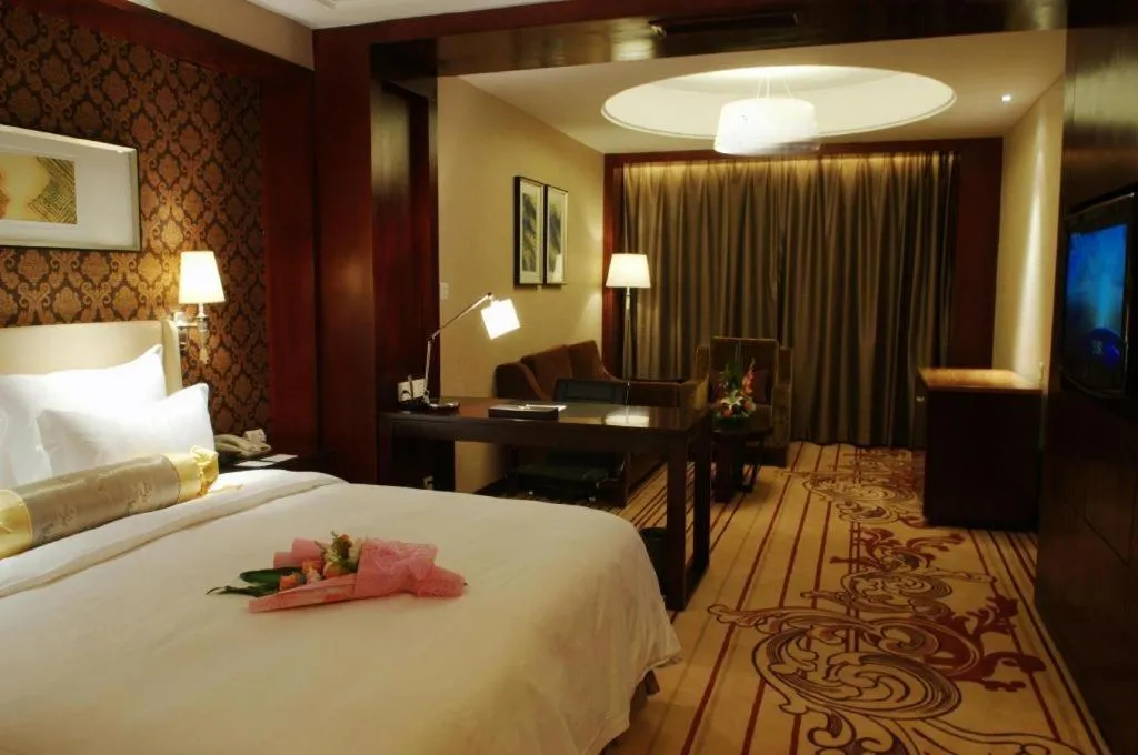 Bed in Yiwu Shinsun International Hotel