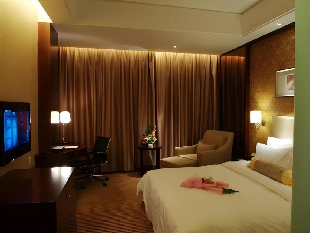 Bed in Yiwu Shinsun International Hotel