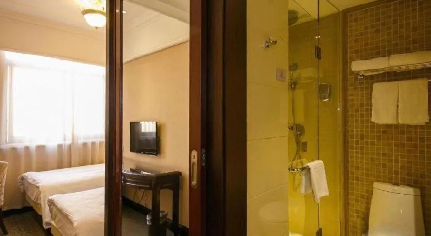 Bed in Hangzhou Silver Star Hotel